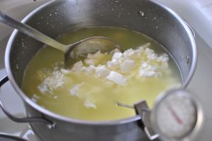 Stir the curds every 10 minutes or so to make sure they don't mat together.